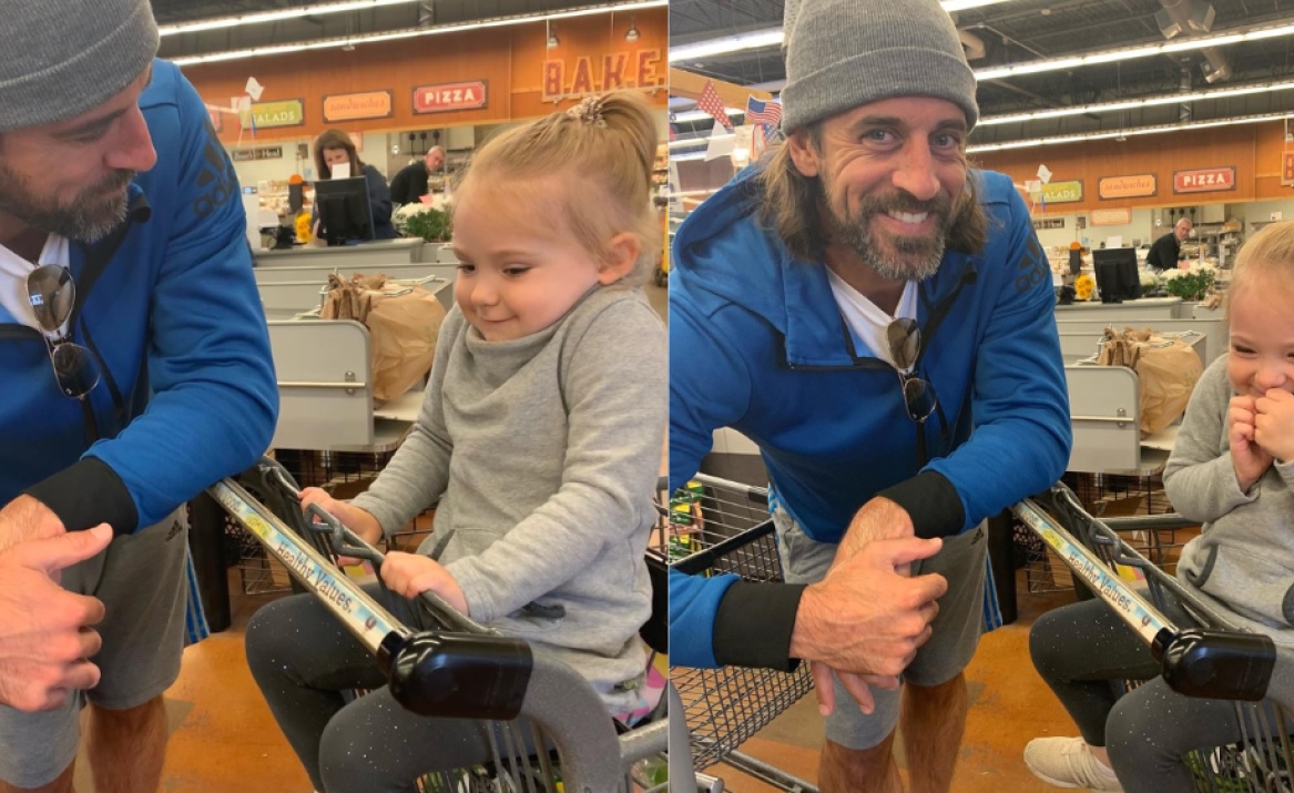 Heartwarming photos of little girl meeting Aaron Rodgers